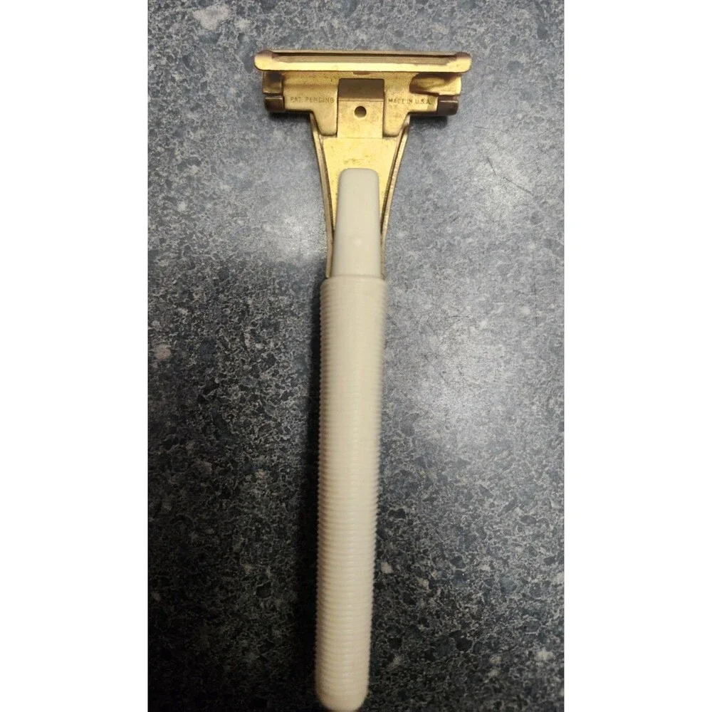 Eversharp Schick Safety Razor Gold Tone Head White Plastic Handle Metal